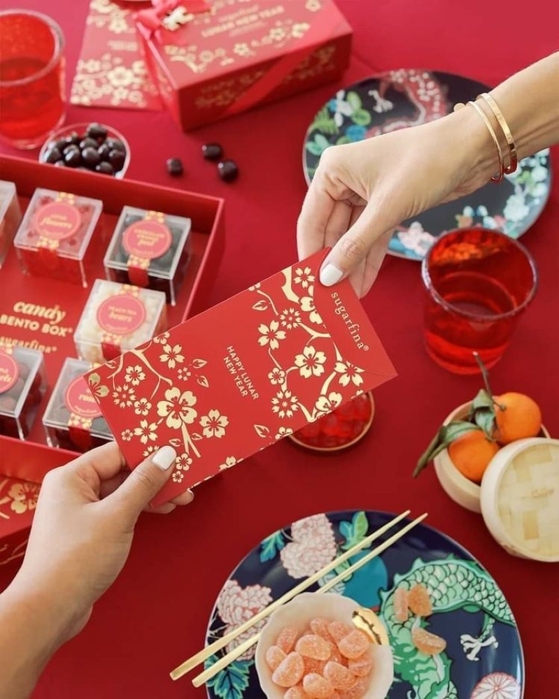li-xi-tuong-trung-cho-may-man-tai-loc Lì xì tượng trưng cho may mắn, tài lộc